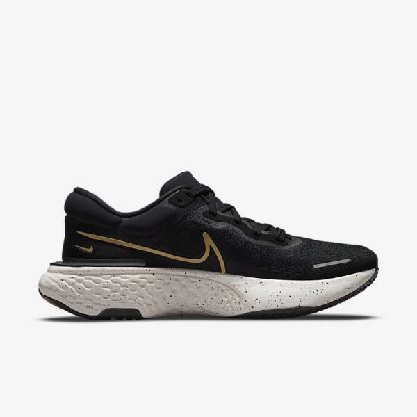 Nike ZoomX Invincible Run Flyknit Road Men's Running Shoes Black / Metal Gold | NK523LWO