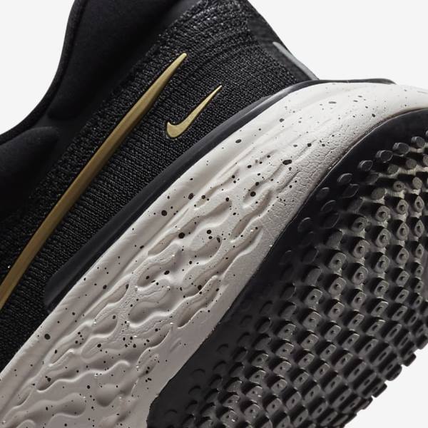 Nike ZoomX Invincible Run Flyknit Road Men's Running Shoes Black / Metal Gold | NK523LWO