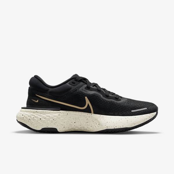 Nike ZoomX Invincible Run Flyknit Road Women's Running Shoes Black / Metal Gold | NK751DNQ