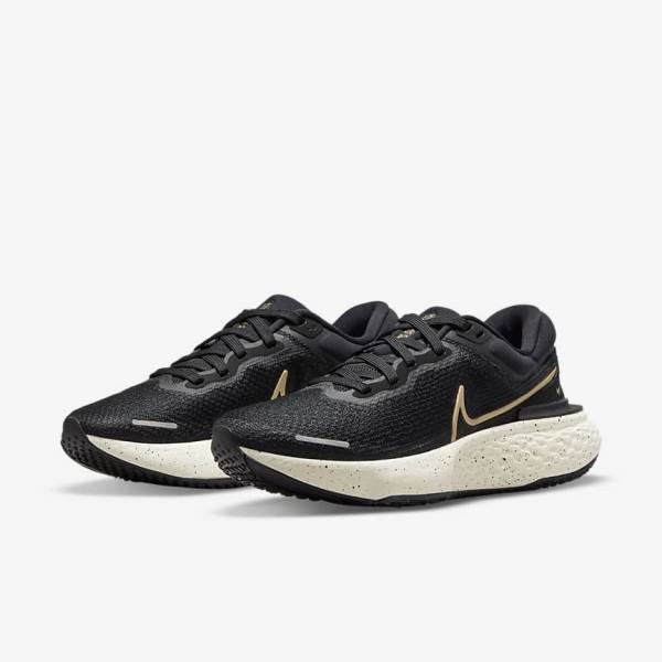 Nike ZoomX Invincible Run Flyknit Road Women's Running Shoes Black / Metal Gold | NK751DNQ