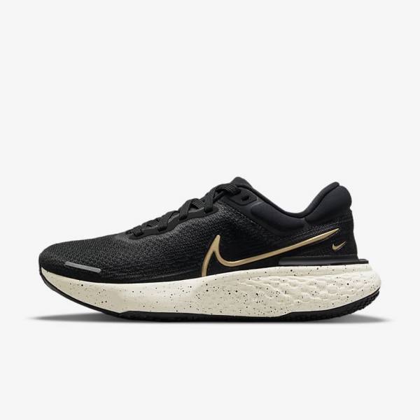 Nike ZoomX Invincible Run Flyknit Road Women\'s Running Shoes Black / Metal Gold | NK751DNQ